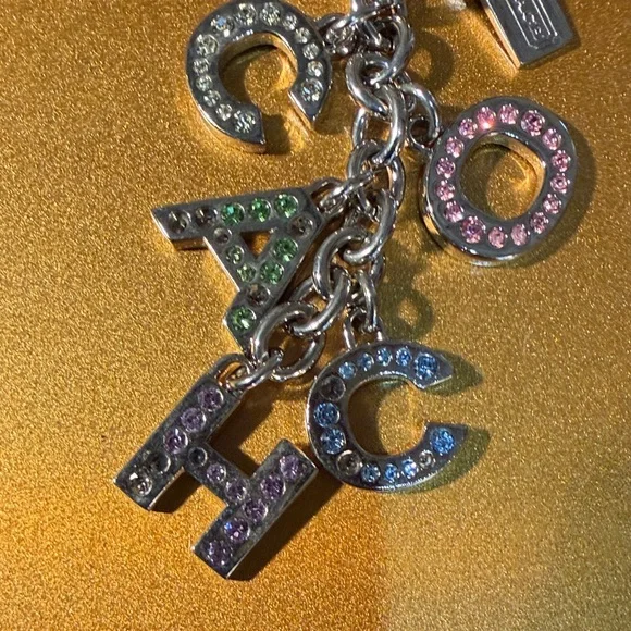 Coach Silver Keychain with Multicolor Letter Charms - Picture 3 of 3